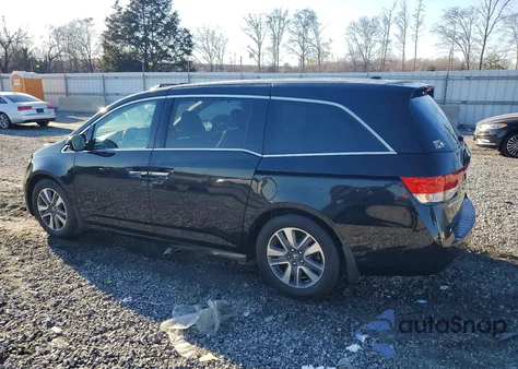 2016 Honda Odyssey Touring z USA, uszkodzony, nr VIN 5FNRL5H98GB013637